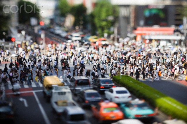 The famous six way pedestrian crossing photographed with a tilt lens in Shibuya, Tokyo, Japan